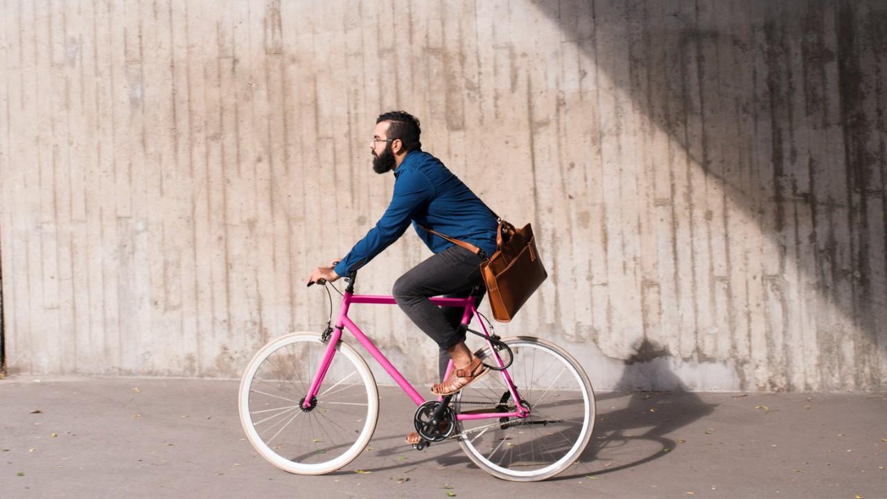 Man cycling on street